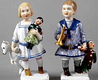 Meissen figures of boy and girl with toys by Oehler A288 and A289