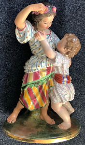 Russian Imperial Porcelain Factory figural group Children with the apple (Boy and Girl) designed by Spiess. Circa 1860.